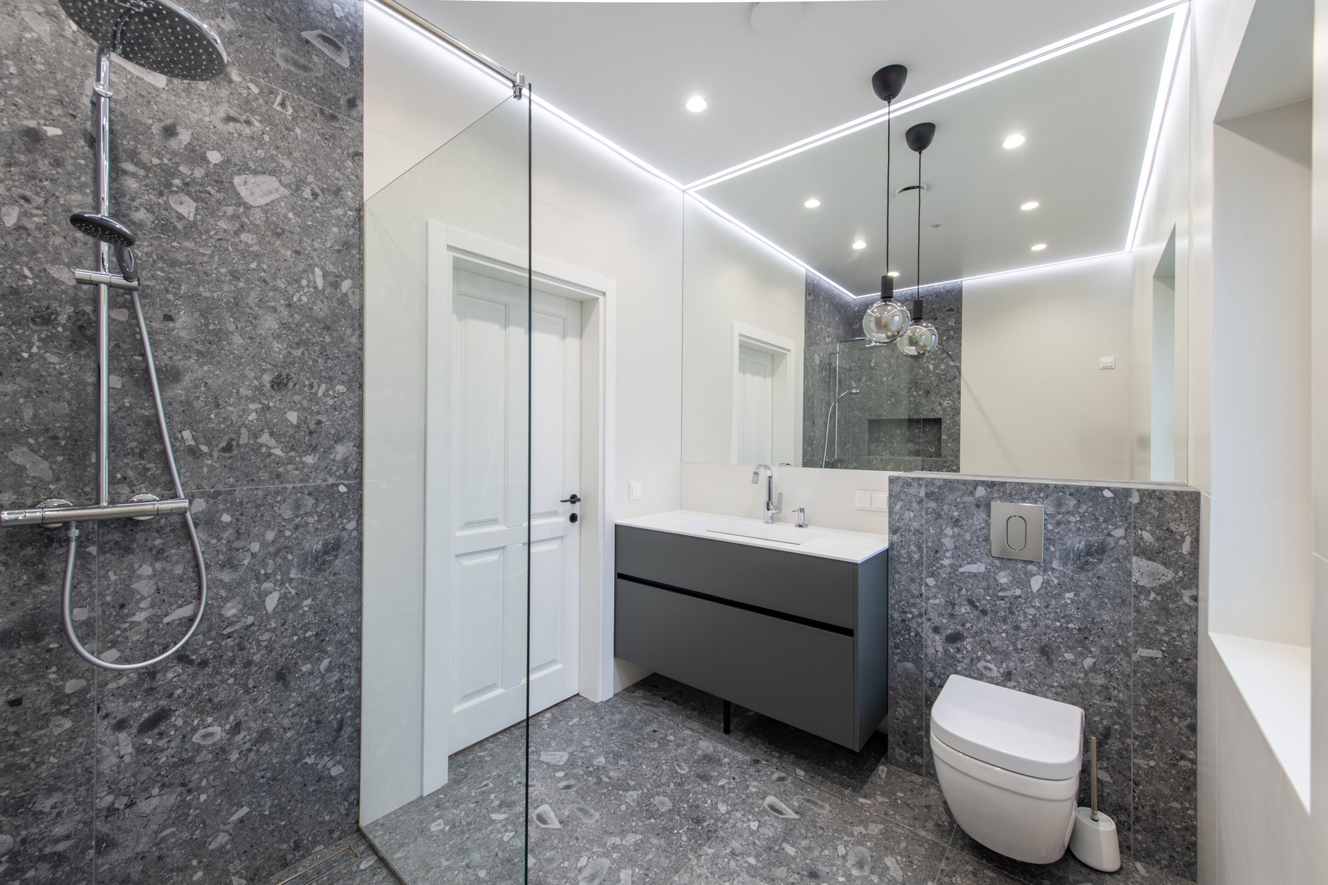 Modern Bathroom with Sleek Design and Elegant Gray Tile Details